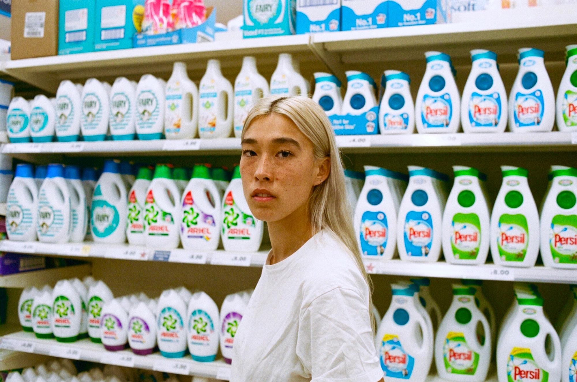 A woman standing in a store.